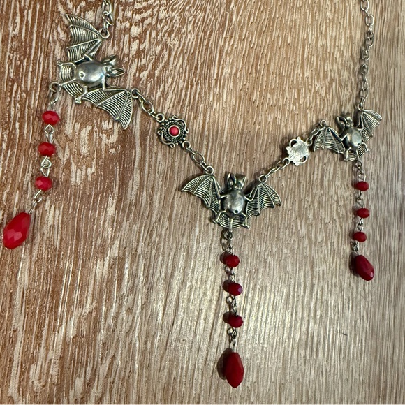 Handmade bats goth necklace
Silver with red accents
Bought off Etsy - Picture 2 of 2